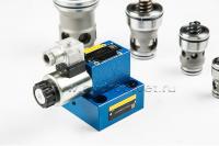 LFA40DRW2-7X/210 - Крышка для логического клапана, типоразмер Ду40 функционал - DRW2 = крышка с редукционным клапаном с ручной настройкой с функцией запирания, под установку распределителя Ду6, три выхода Z2, X и Y, элемент регулировки - винт под шестигра